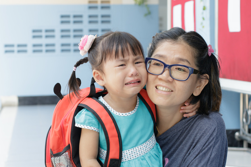 children and mother crying first day go to pre-kindergarten school